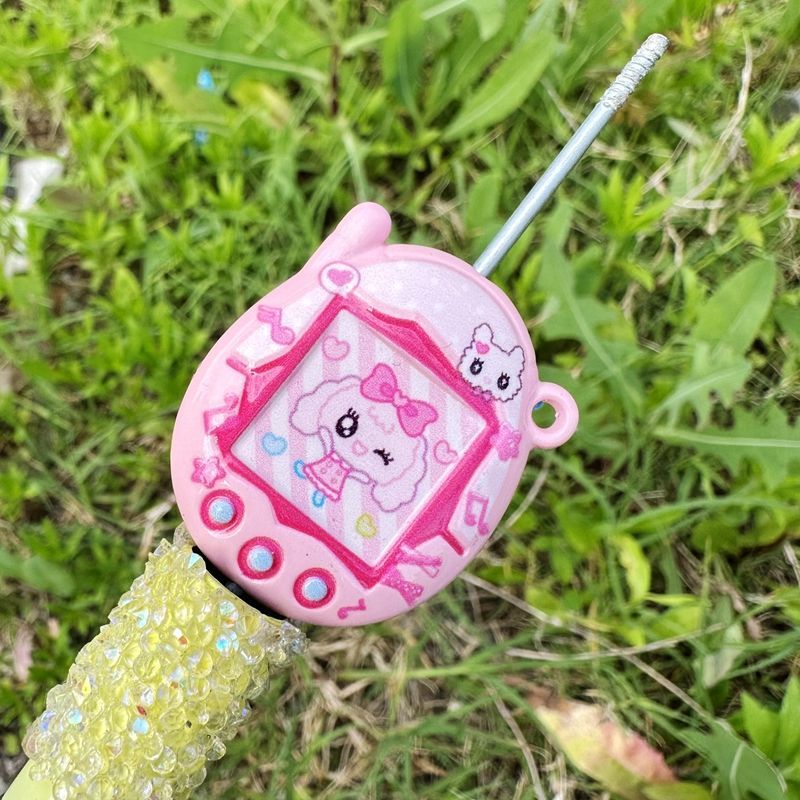 Tamagotchi double-sided printe - مراجعة Phone Accessories Keychain وسعره